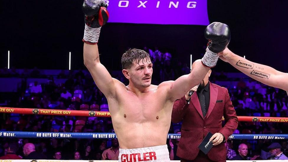 Lee Cutler celebrates after victory in his fight